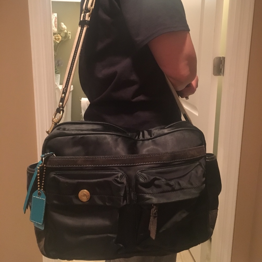 Nylon black coach diaper bag with leather accents